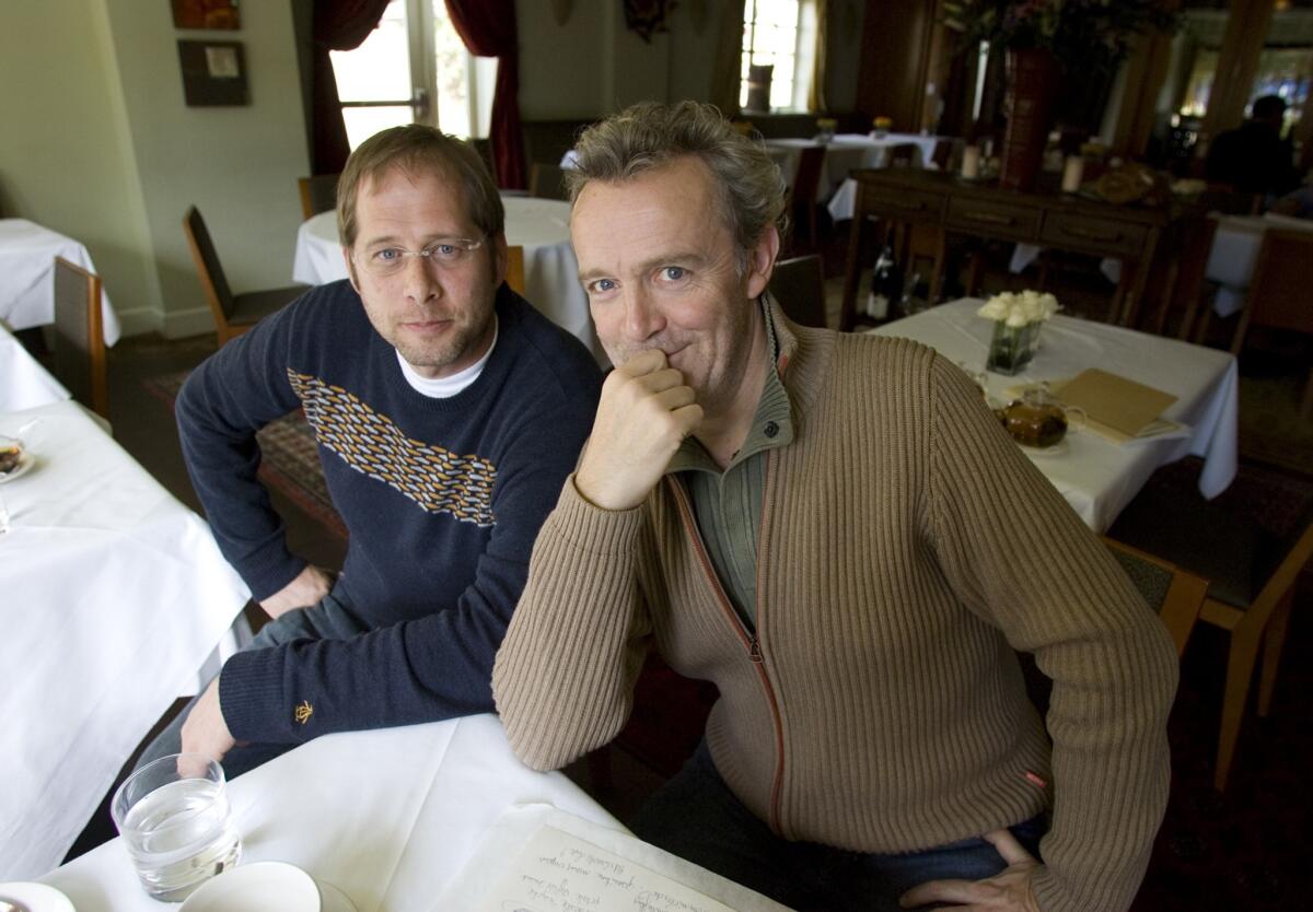 David Kinch, chef-proprietor at Manresa, left, is photographed with French chef Alain Passard at the restaurant in 2007. An early morning fire burned through Manresa's kitchen and service area at Manresa on Monday.