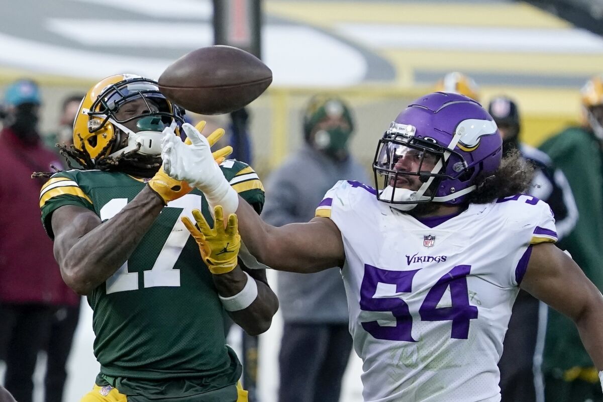 Minnesota Vikings' Eric Kendricks breaks up a pass intended for Green Bay Packers' Davante Adams during the second half of an NFL football game Sunday, Nov. 1, 2020, in Green Bay, Wis. (AP Photo/Morry Gash)