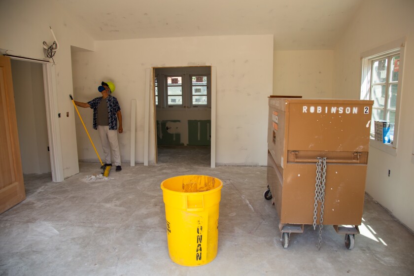 Gonzalo Rojas, a former House of Mexico board member inspects the interior of the new House of Mexico.
