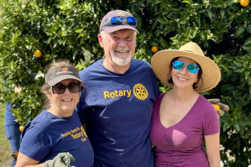 Rotarians Cindy Wurthrich, Greg Day, and Paula Shaw