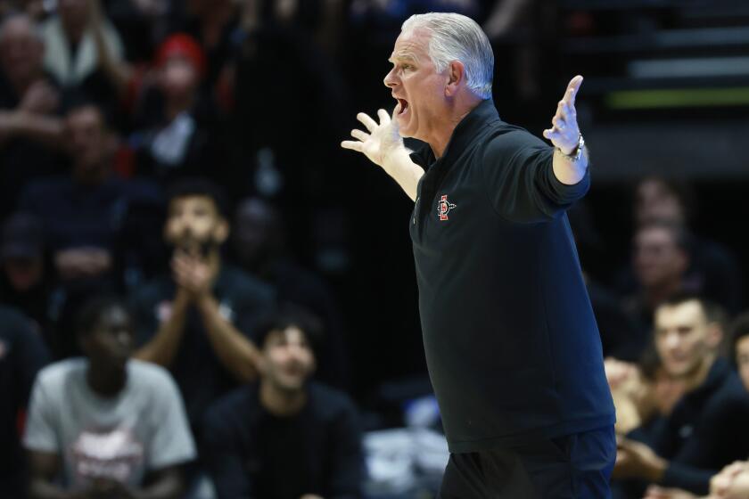 San Diego CA - February 16: San Diego State coach Brian Dutcher argues a call duing a game against New Mexico at Viejas Arena on Friday, February 16, 2024 in San Diego, CA. (K.C. Alfred / The San Diego Union-Tribune)