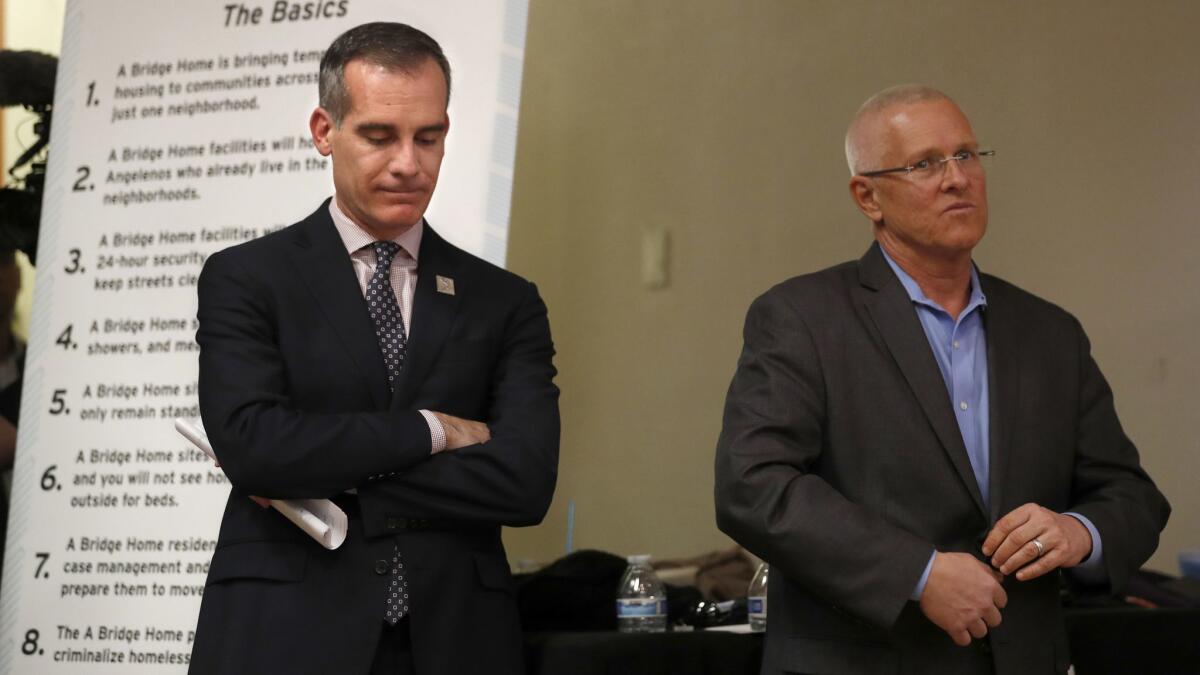 Mayor Eric Garcetti, left, and Councilman Mike Bonin at Wednesday's town hall.