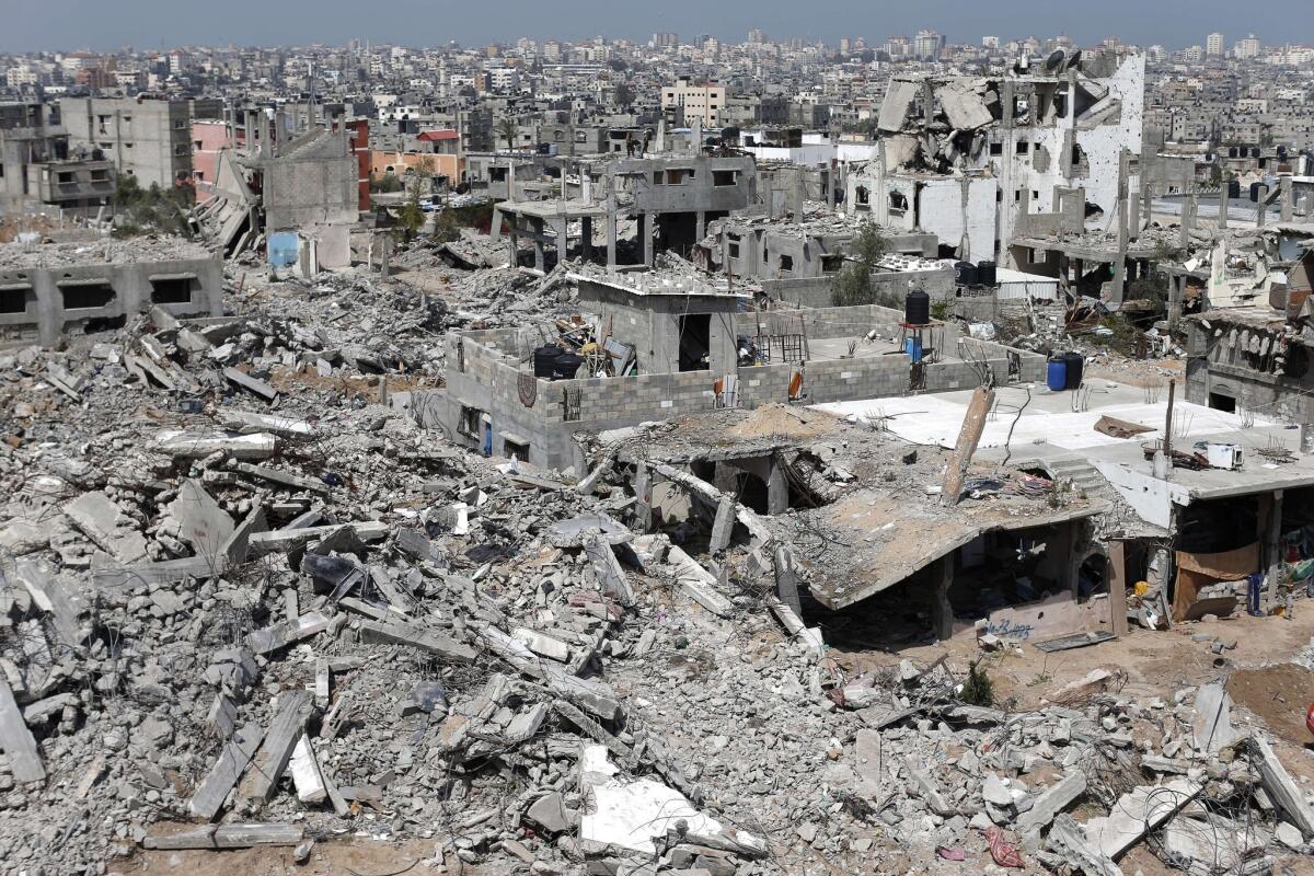 A picture taken on April 15 shows a general view of heavily damaged buildings in the eastern Gaza City neighborhood of Shejaiyah, which was destroyed during the 50-day war between Israel and Hamas militants in summer 2014.