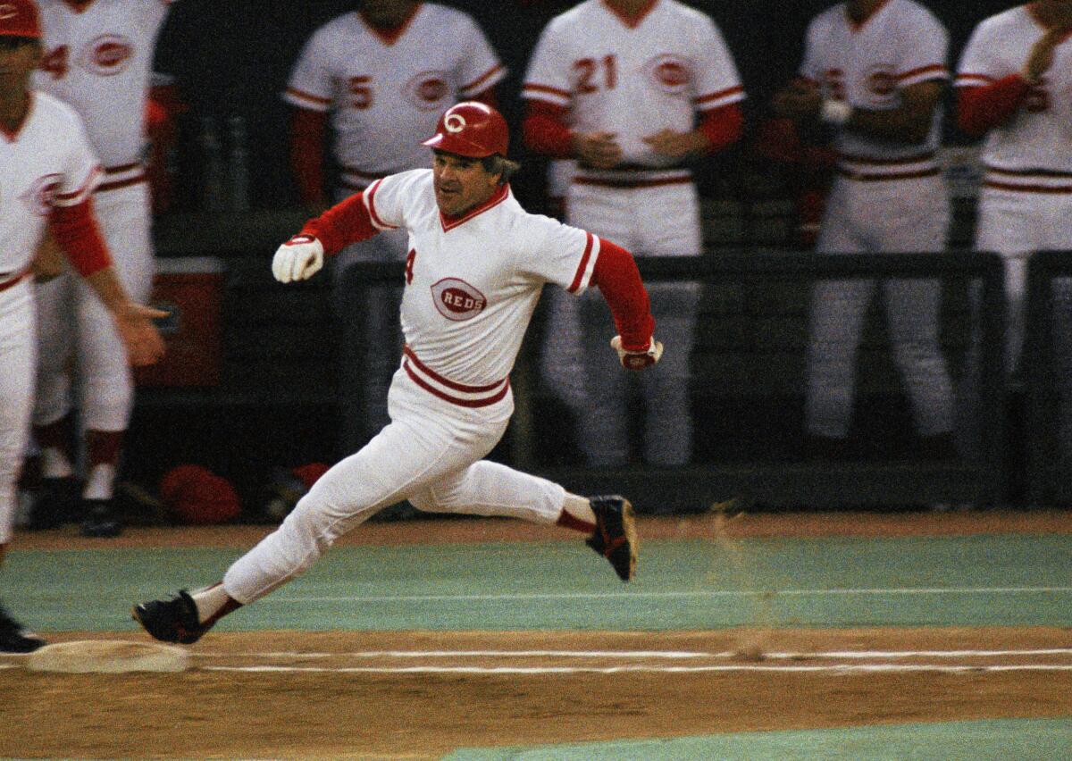 Reds' Pete Rose first base hit after hitting a single to break Ty Cobb's record for career hits