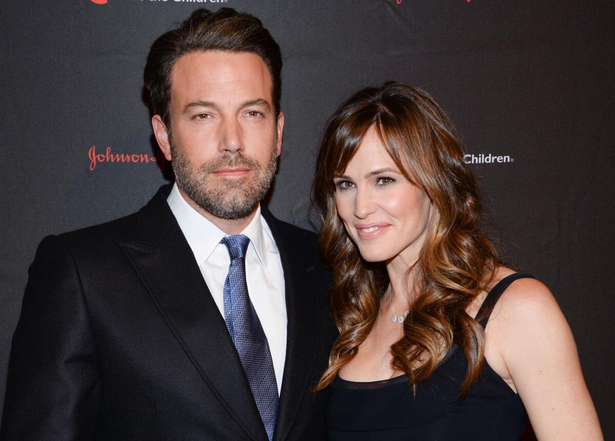 Ben Affleck and Jennifer Garner are shown in November 2014. The two announced over the summer their intention to divorce, but they have yet to file formal paperwork in court.