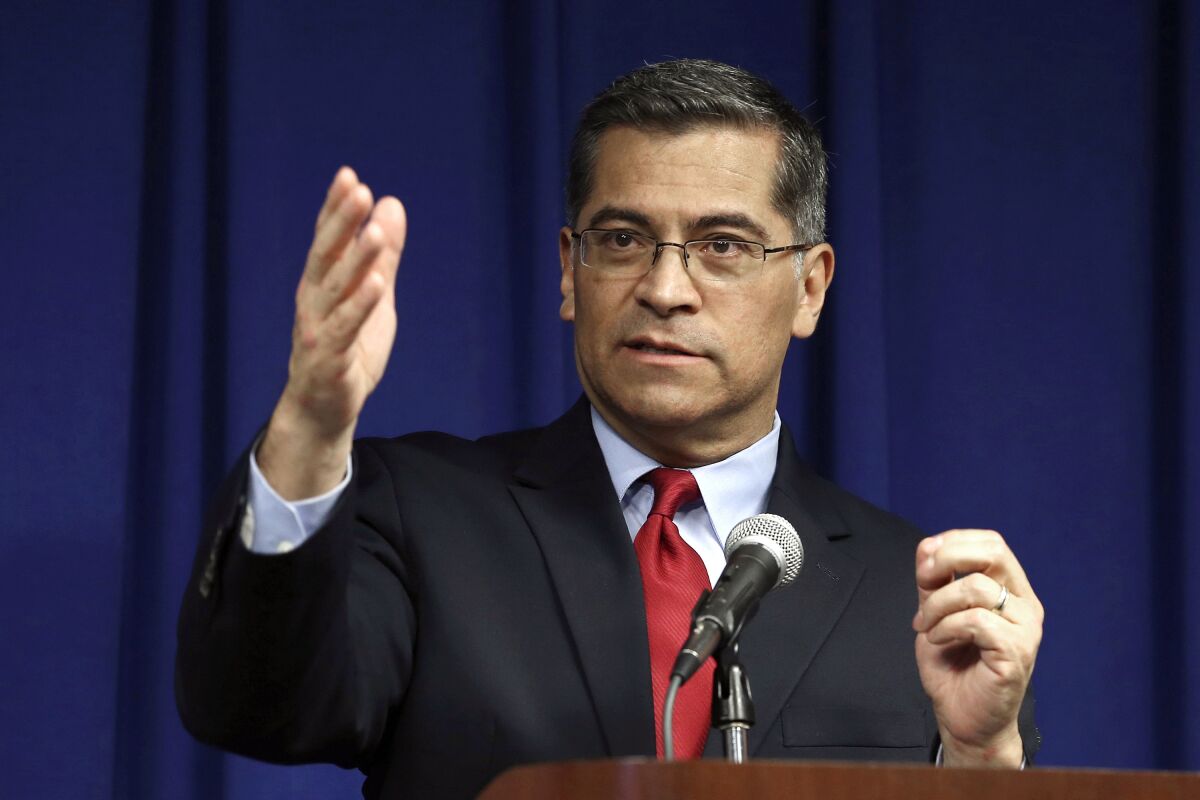 FILE - In this March 5, 2019, file photo, California Attorney General Xavier Becerra speaks during a news conference in Sacramento, Calif. President-elect Joe Biden has picked Becerra to be his health secretary, putting a defender of the Affordable Care Act in a leading role to oversee his administration’s coronavirus response. (AP Photo/Rich Pedroncelli, File)