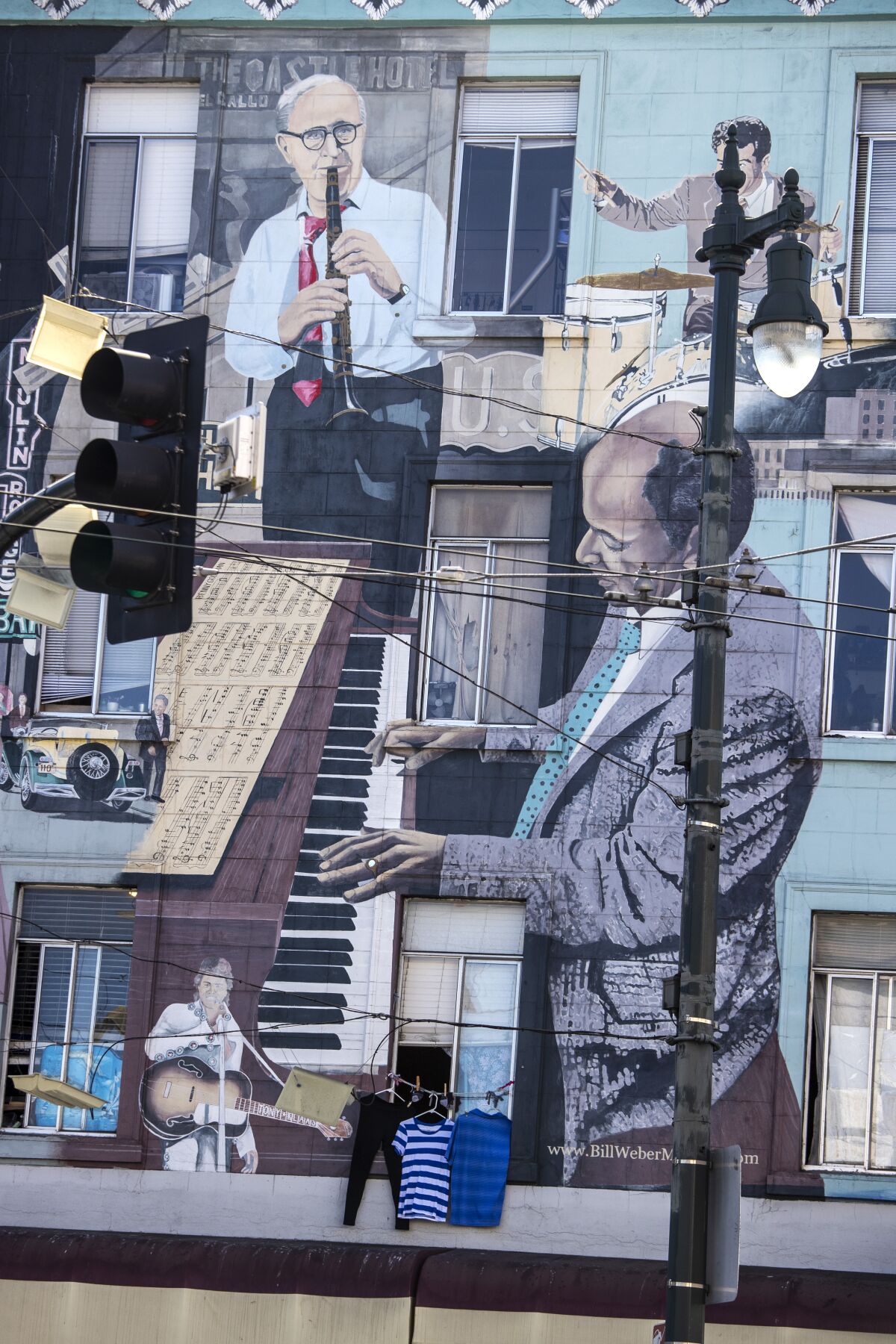 Bill Weber’s “Jazz Mural” adorns a building at the intersection of Broadway and Columbus Avenue in San Francisco's North Beach neighborhood.