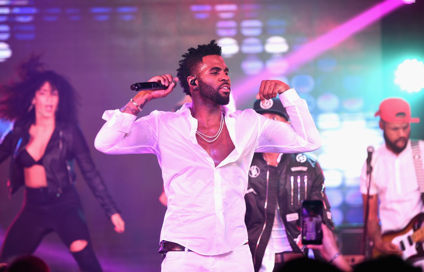 Jason Derulo performs at the "Harmonist" cocktail party at the Plage du Grand Hyatt during the Cannes Film Festival on Sunday.