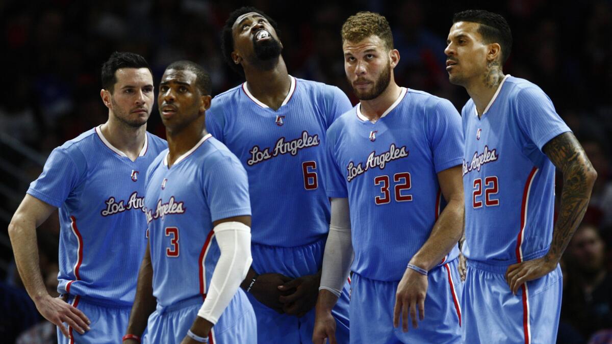 Clippers teammates (from left) J.J. Redick, Chris Paul, DeAndre Jordan, Blake Griffin and Matt Barnes wait for a referee's call during a win over the New Orleans Pelicans on March 22.