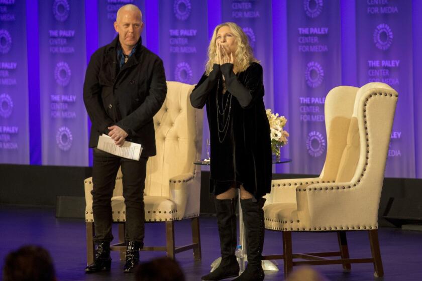 HOLLYWOOD,CA --FRIDAY, MARCH 16, 2018--Barbara Streisand greets the audience, with host Ryan Murphy, on the first night of PaleyFest, at the Dolby Theatre, in Hollywood, CA, March 16, 2018. (Jay L. Clendenin / Los Angeles Times)