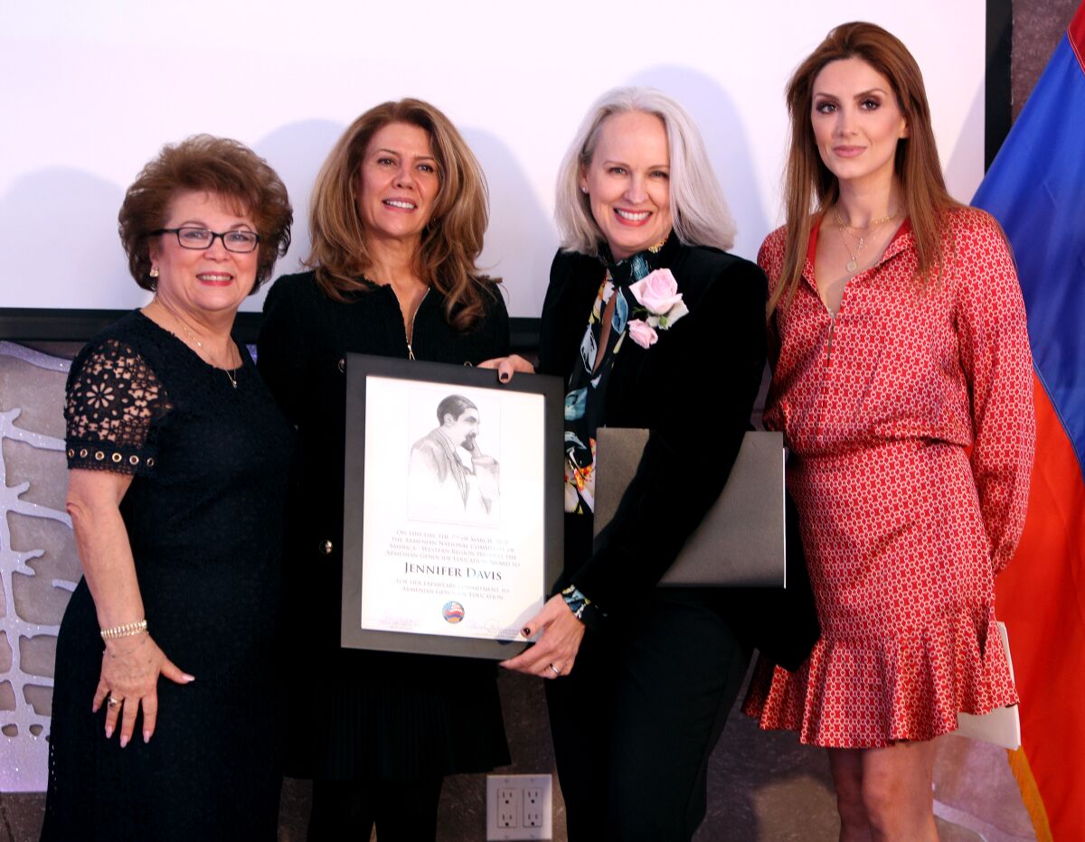 Clark Magnet High School teacher Jennifer Davis, second from right, won the Armenian Genocide Education Award at the annual Armenian Genocide Education Awards Luncheon, in Burbank on Saturday, March 7. Left to right are Alice Petrossian, Hermineh Pakhanians, Davis and Ellina Abovian.