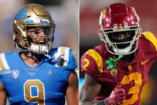 UCLA wide receiver Jake Bobo, left, and USC wide receiver Jordan Addison during the 2022 college football season.