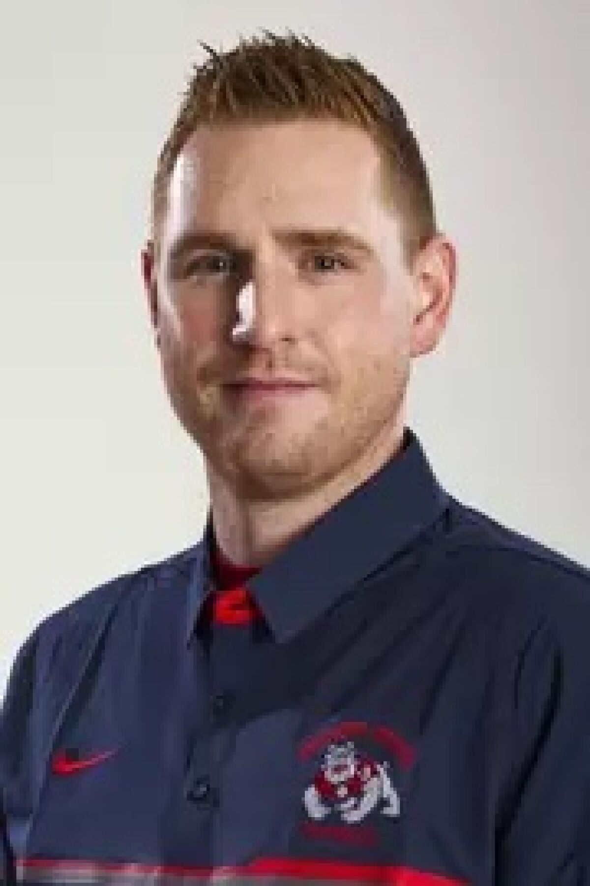 Crespi hires college assistant Brad Vonnahme as new football coach