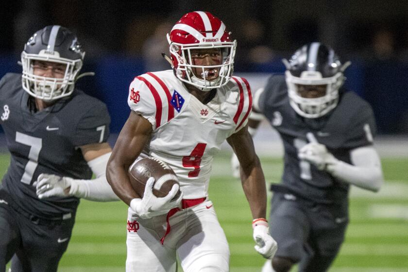 BELLFLOWER, CALIF. -- FRIDAY, OCTOBER 25, 2019: St. John Bosco free safety Jake Newman, left, and cornerback Josh Alford.