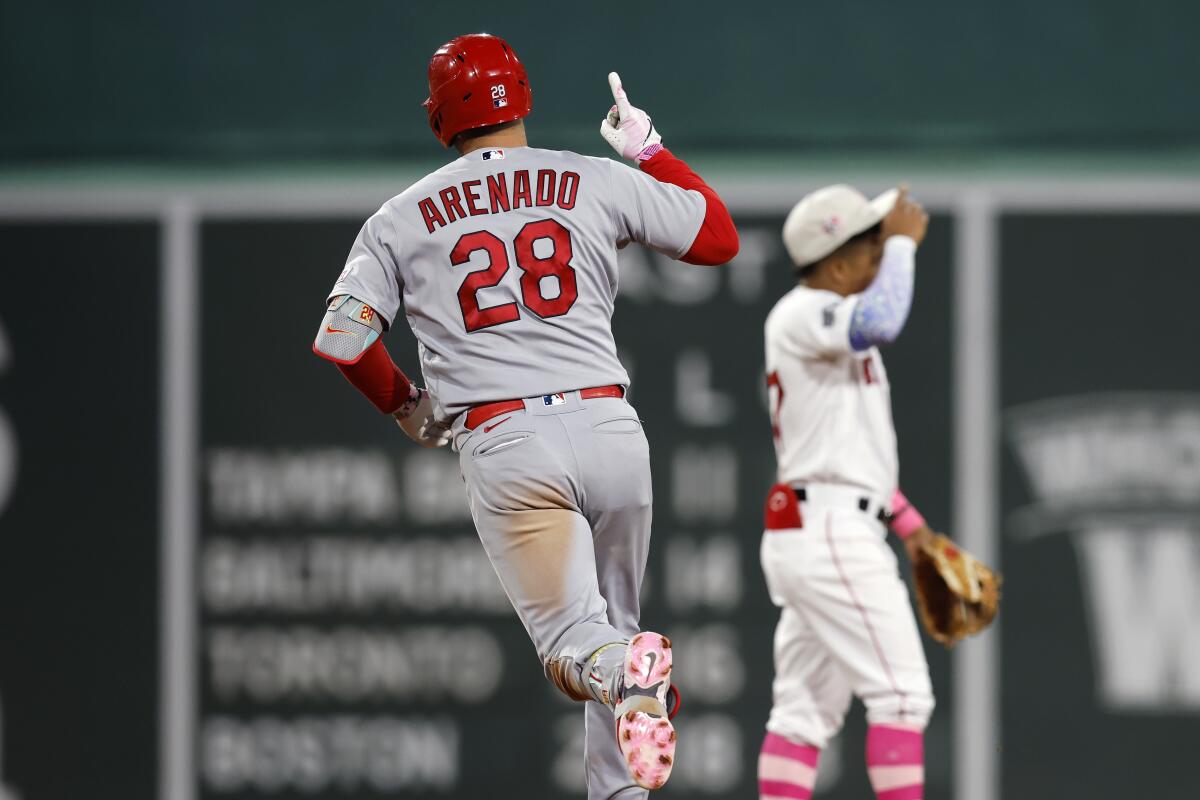 Three homers send Angels to sweep of Red Sox