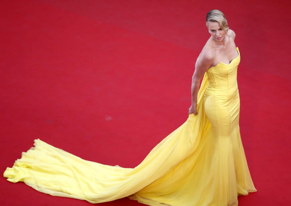 Charlize Theron arrives for the screening of "Mad Max: Fury Road" during the 68th annual Cannes Film Festival.