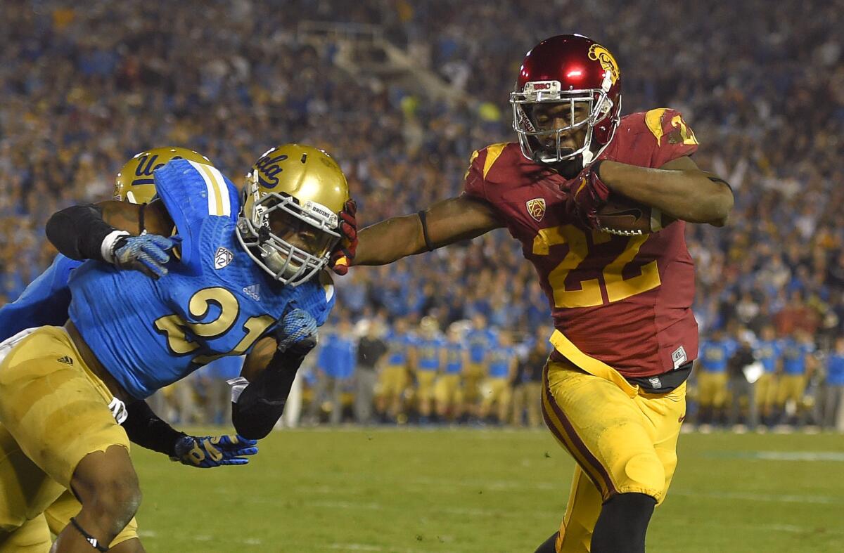 Running back Justin Davis and the Trojans will try to beat UCLA for the first time in four years.