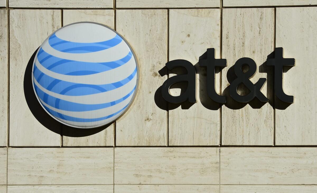 The AT&T logo at Whitacre Tower, the AT&T global headquarters building at One AT&T Plaza in Dallas.