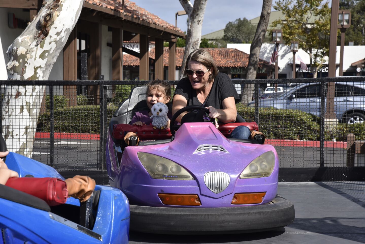 Emily and mom Alison Cowling enjoy the bumper cars