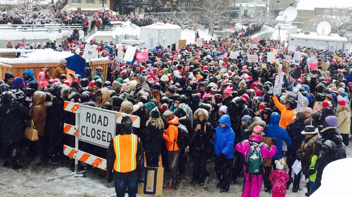Protesters prepare to march for women's rights during the Sundance Film Festival in Park City, Utah.