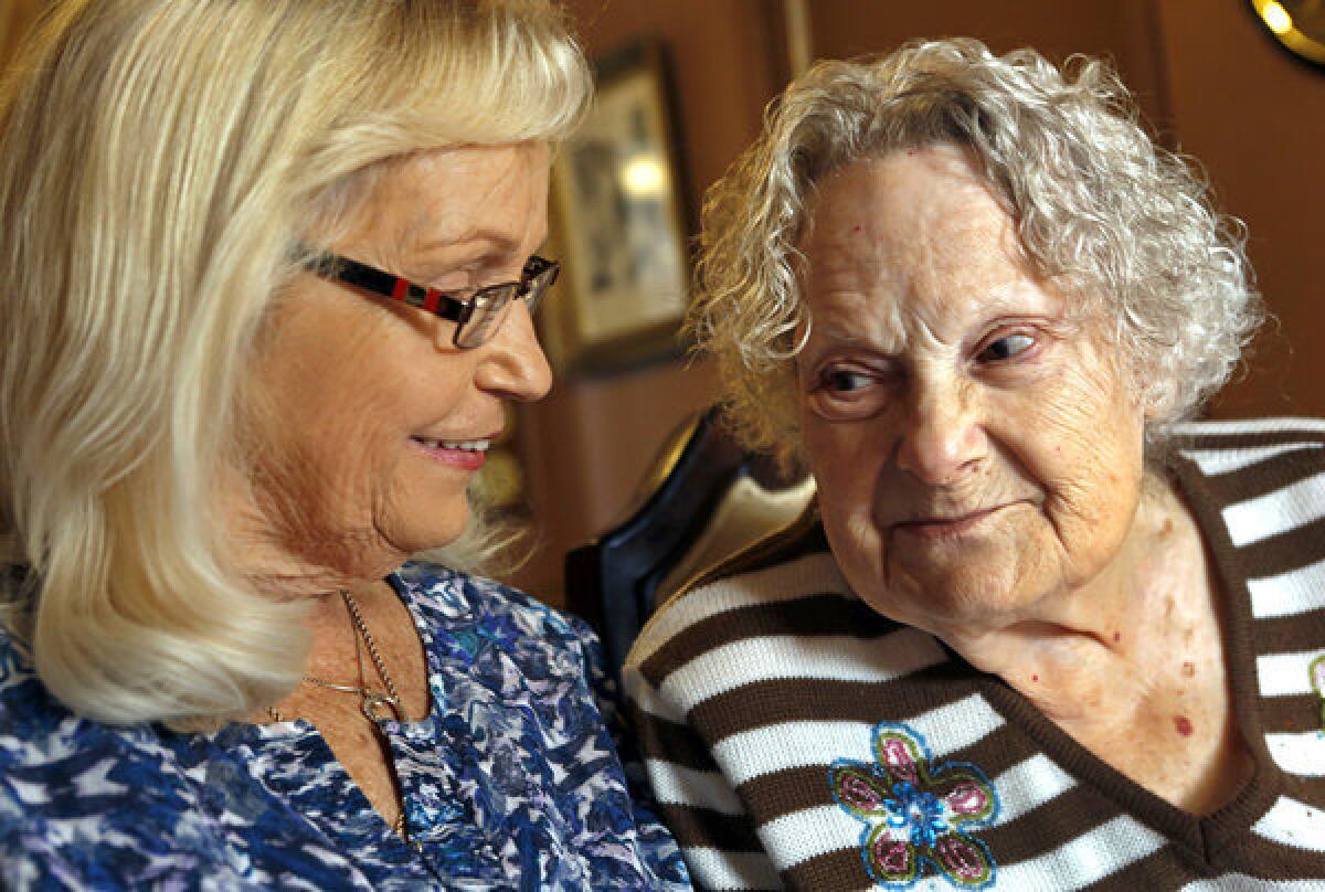 Patricia Hamlin, 71, left, and her mother Brooke Mayo, 90, are photographed at Mayo's home in Paso Robles on December 18, 2013.