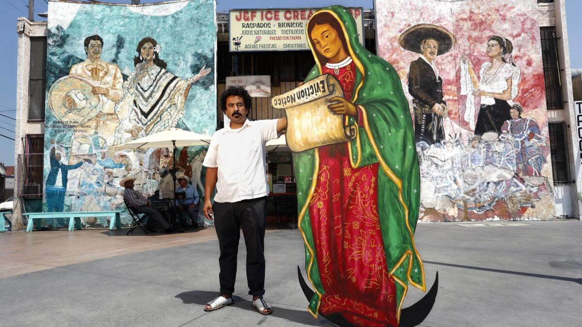 Nico Avina with “Lupita Was Displaced” in Boyle Heights.