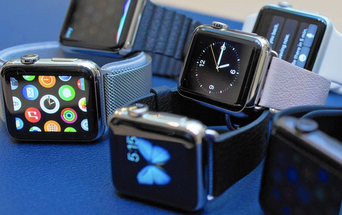 An assortment of Apple's new watch are displayed in London.