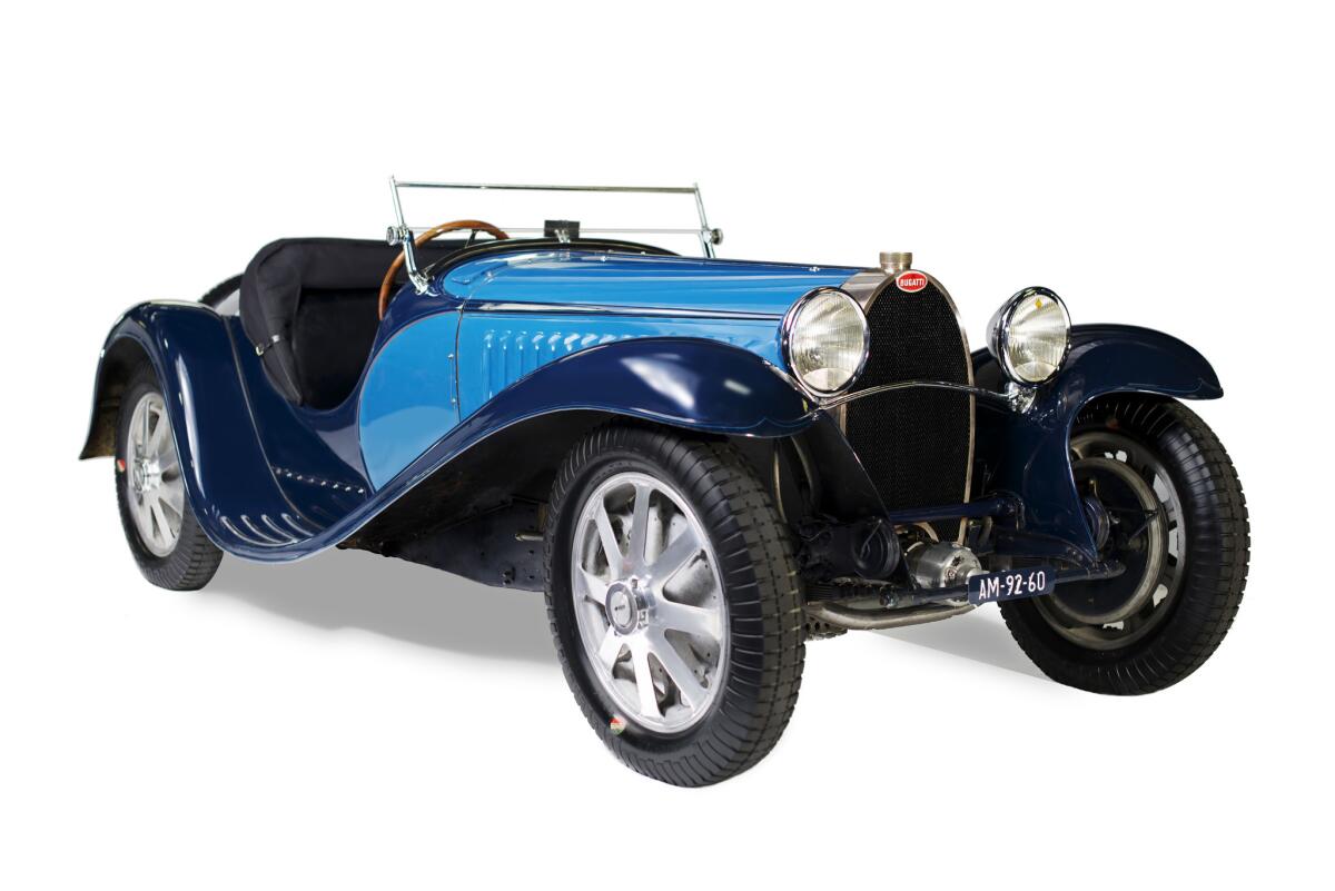A vintage Bugatti Type 55 roadster is among the many automobiles and artworks on display at the Petersen Automotive Museum's "Art of the Bugatti" exhibit.