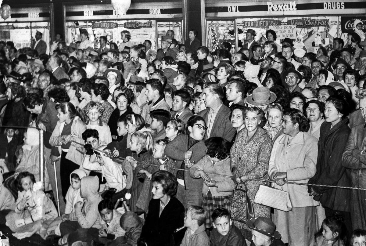Nov. 22, 1961: Thousands  watch the Santa Claus Lane parade on Hollywood Boulevard,