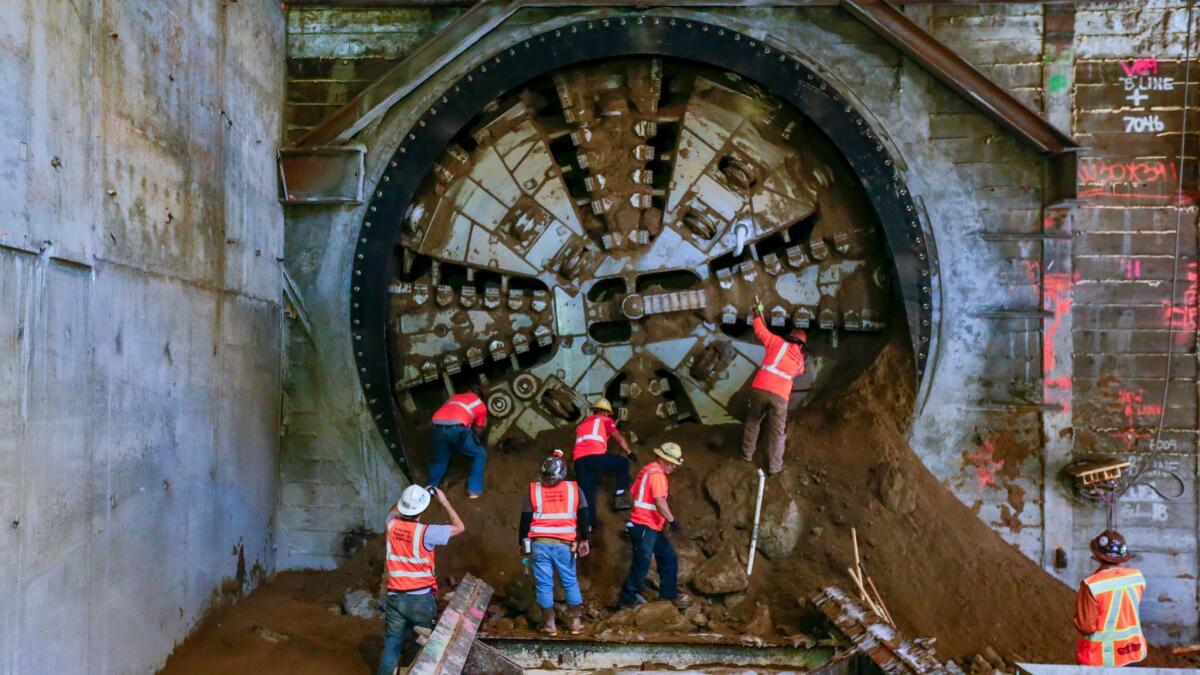 The tunnel-boring machine for the Crenshaw/LAX Line breaks through into the future site of the Leimert Park station in South Los Angeles in October. The 8.5-mile route will connect the Expo Line to the Green Line.