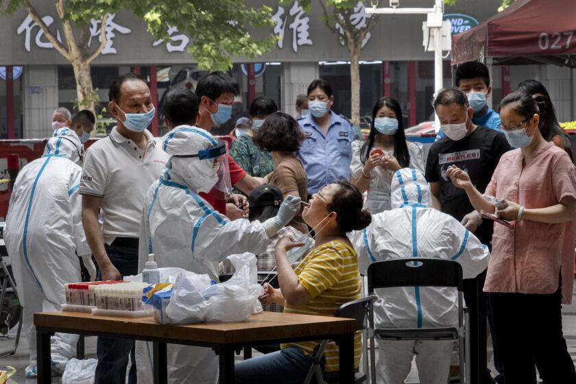 13 May, the residents of Yu Dai community Qiao Kou district are accepting the nucleic acid testing in the square of the commnuty. An officer says the number of the commnity is around 1700. Wuhan city is carring out the Covid-19 virus nucleic acid testing for all people of the city. In the official news on 12 May, the test will last ten days.