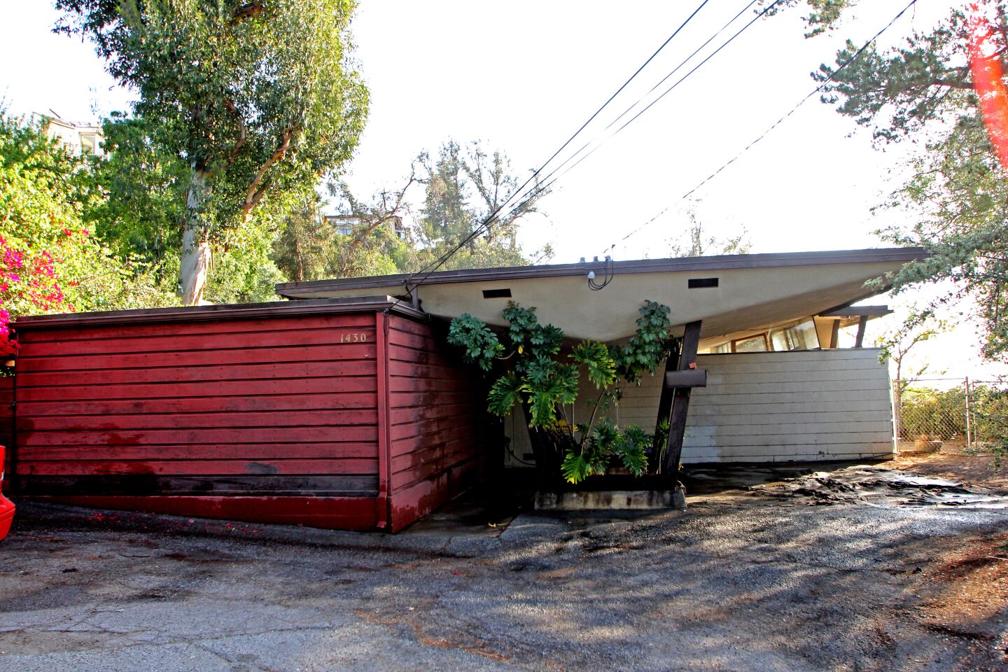BEFORE - CARPORT: A previous owner had converted the carport into a bedroom.
