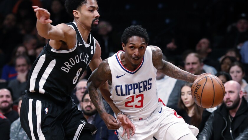 Clippers guard Lou Williams drives past Nets guard Spencer Dinwiddie during the first half Monday night at the Barclays Center.