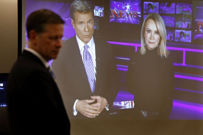 San Diego CA - February 14: Ken Fitzgerald, attorney KUSI, shows a video of Allen Denton and Sandra Maas during the opening statements of a lawsuit by former anchor Sandra Maas against her former employer McKinnon Broadcasting Co. in San Diego Superior Court on Tuesday, February 14, 2023. (K.C. Alfred / The San Diego Union-Tribune)