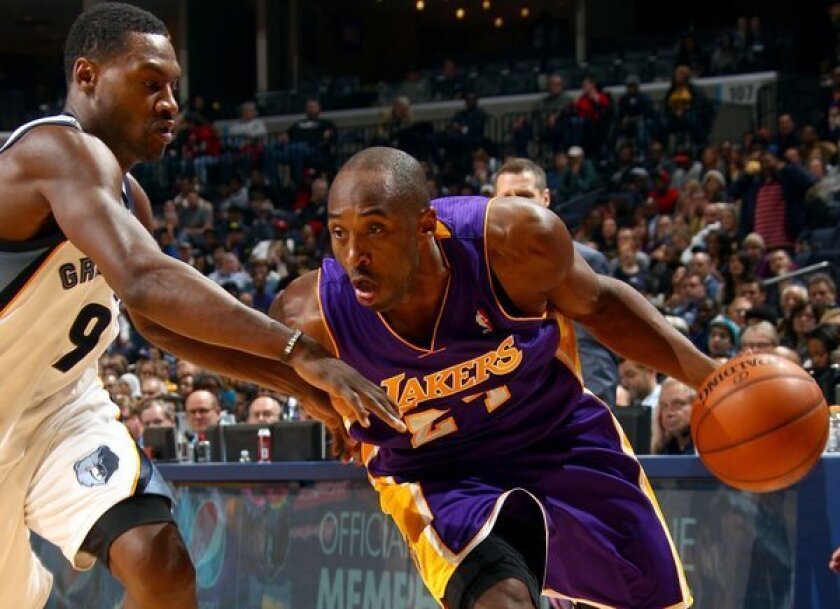 Kobe Bryant drives against Tony Allen en route to a 21-point performance in the Lakers' 96-92 win over the Memphis Grizzlies at FedExForum last week.