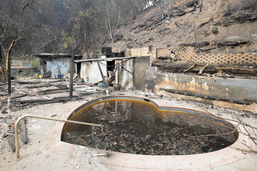 Burned-out remains of Harbin Hot Springs, a popular clothing-optional health resort, are seen after the Valley fire roared through the area near Middletown, Calif.