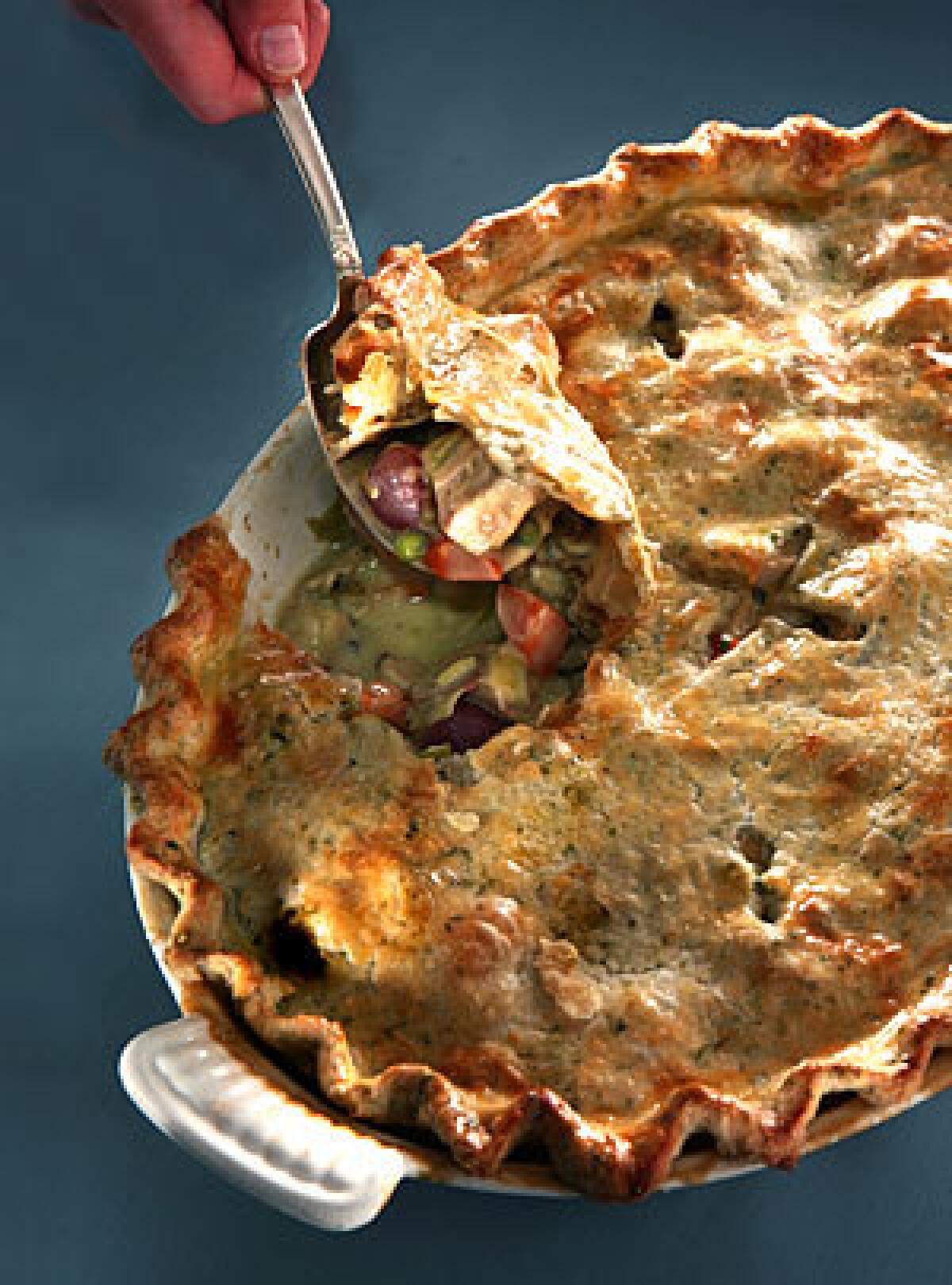Pot pie is filled with turkey, pearl onions, mushrooms, potatoes and peas. Check out the recipe here.