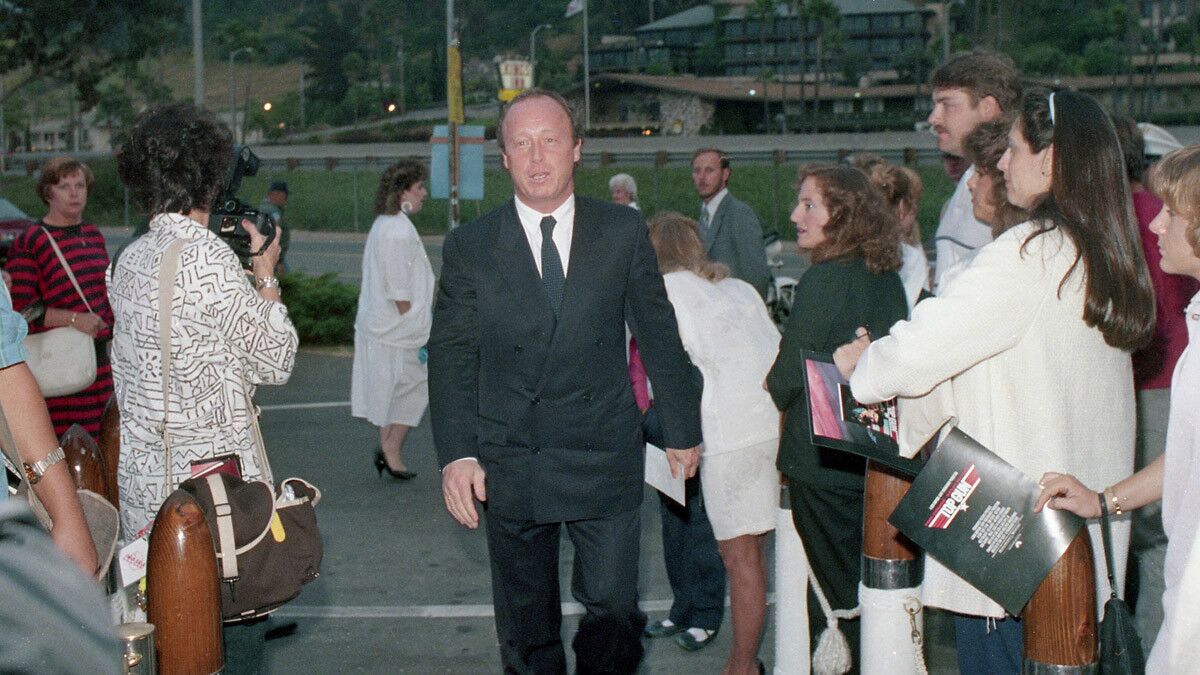 Director Tony Scott arrives at the benefit West Coast premiere of the movie "Top Gun" at Mann's Cinema 21 in Mission Valley on May 15, 1986. (Photo by Bob Redding/The San Diego Union-Tribune) User Upload Caption: U-T file photos at the West Coast premiere of the movie "Top Gun" at Mann's Cinema 21 in Mission Valley on May 15, 1986.
