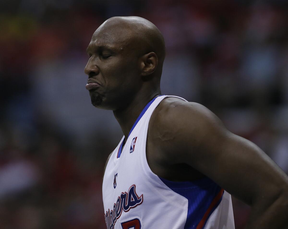 Lamar Odom plays in a Clippers basketball game last spring at Staples Center.
