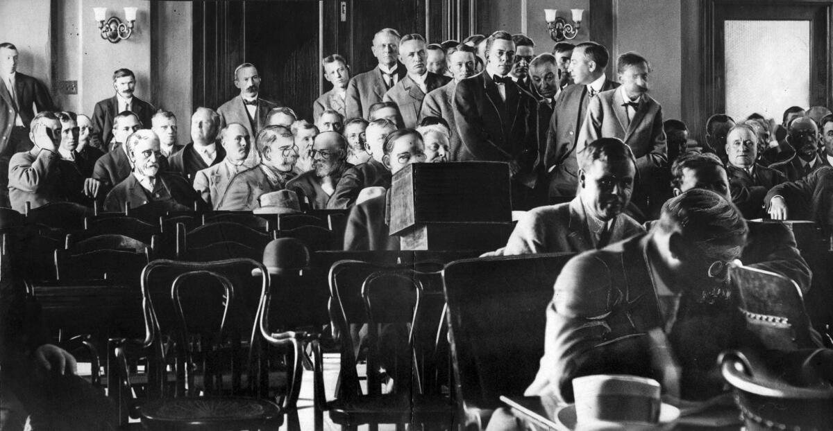 Oct. 9, 1911: Photo from courtroom during jury selection for McNamara brothers trial. The jury pool was reduced from 125 to 40 during the day's proceedings. This image was published in the Oct. 10, 1911, Los Angeles Times. Many of the faces were touched up by a Times artist.