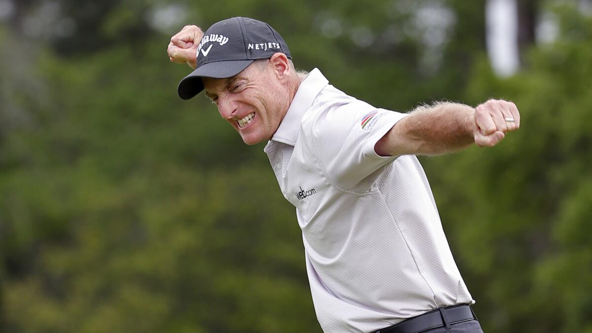 Jim Furyk reacts after his winning putt on the 17th green during the final round of the RBC Heritage in Hilton Head Island, S.C., on Sunday.