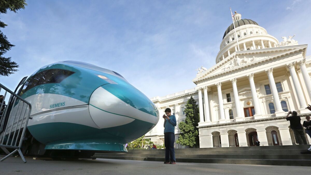 A full-scale mock-up of a high-speed train is displayed at the state Capitol in Sacramento.