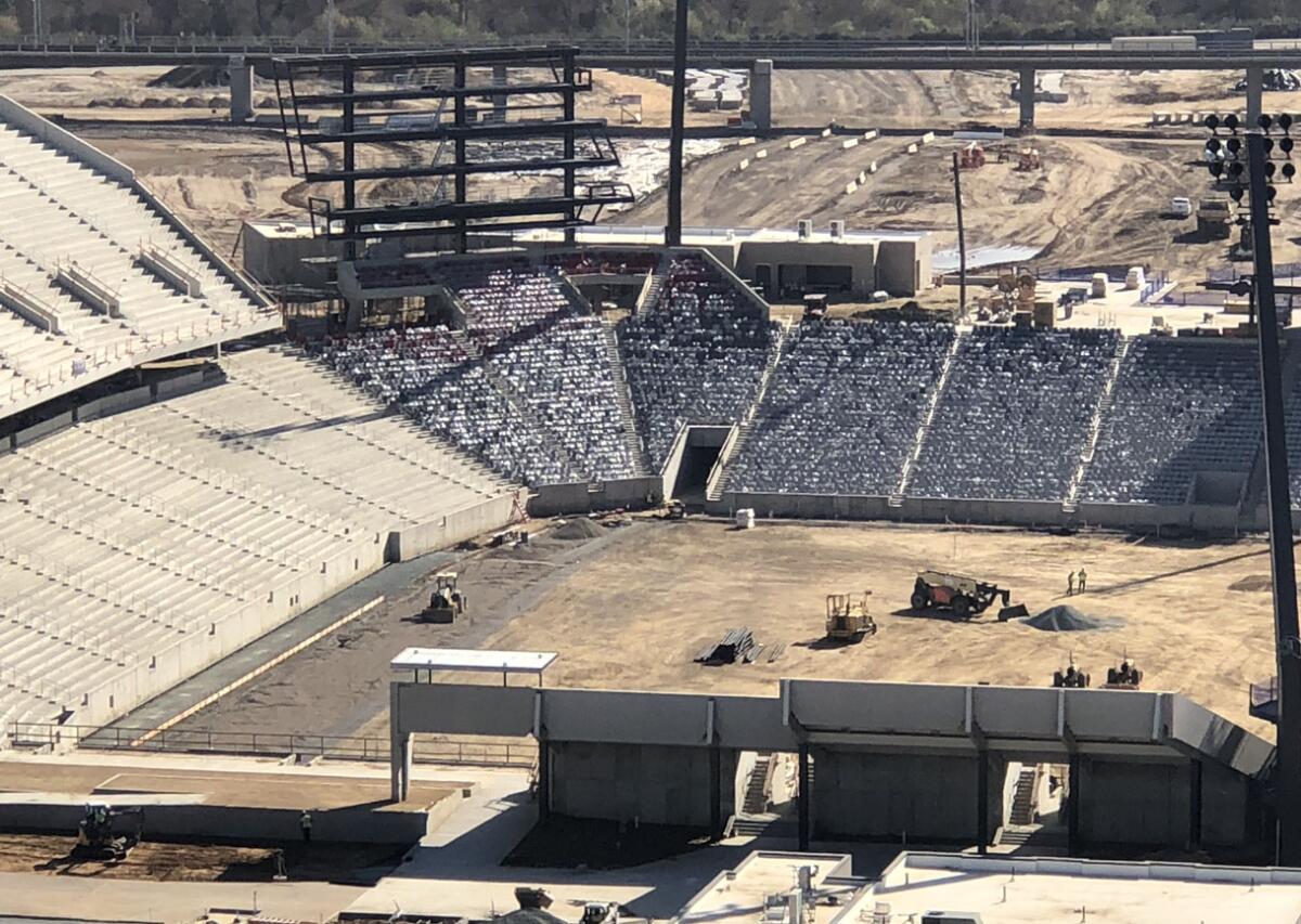Seat installation, which began in the south end zone, is ongoing and video board construction starts later this month.