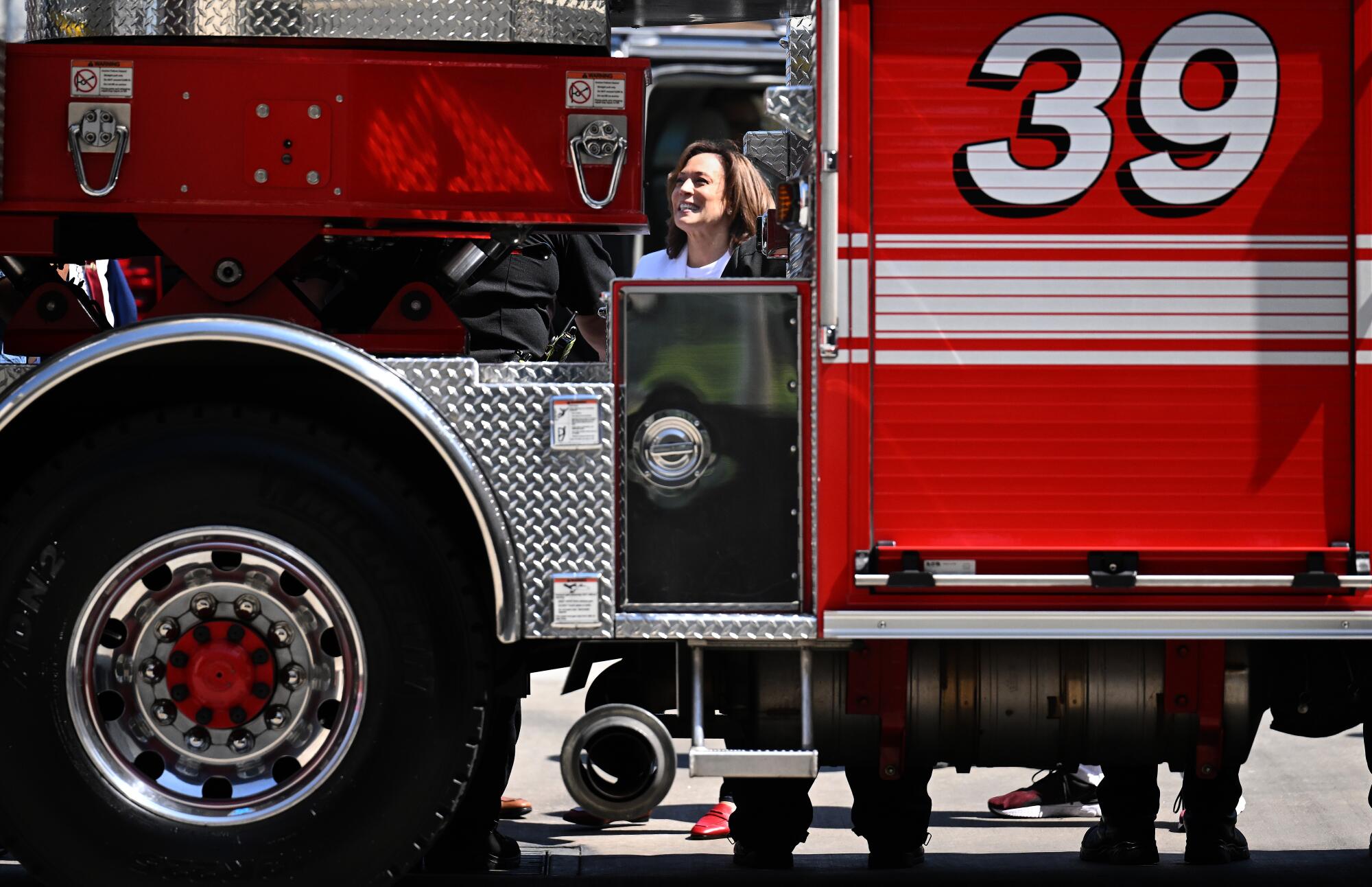 Vice President Kamala Harris with a firetruck