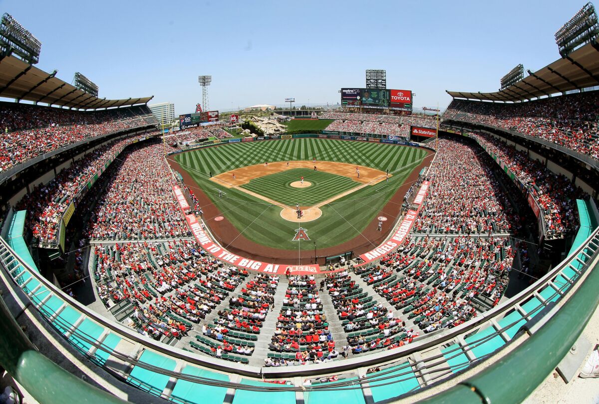 The Anaheim City Council voted Friday to sell Angel Stadium and the surrounding parking lots to a company controlled by team owner Arte Moreno.