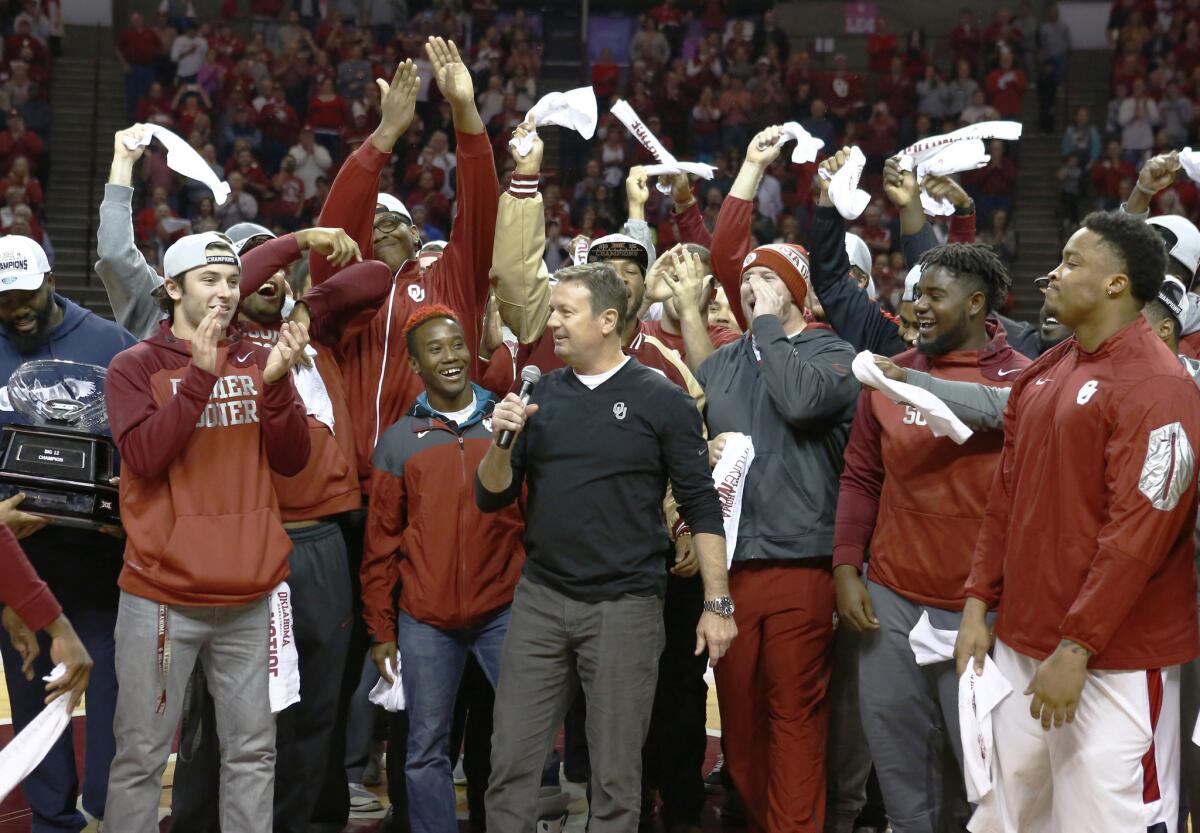 Bob Stoops, center, and the Oklahoma Sooners have already made their final statement for the College Football Playoff selection committee with a thrashing of Oklahoma State.