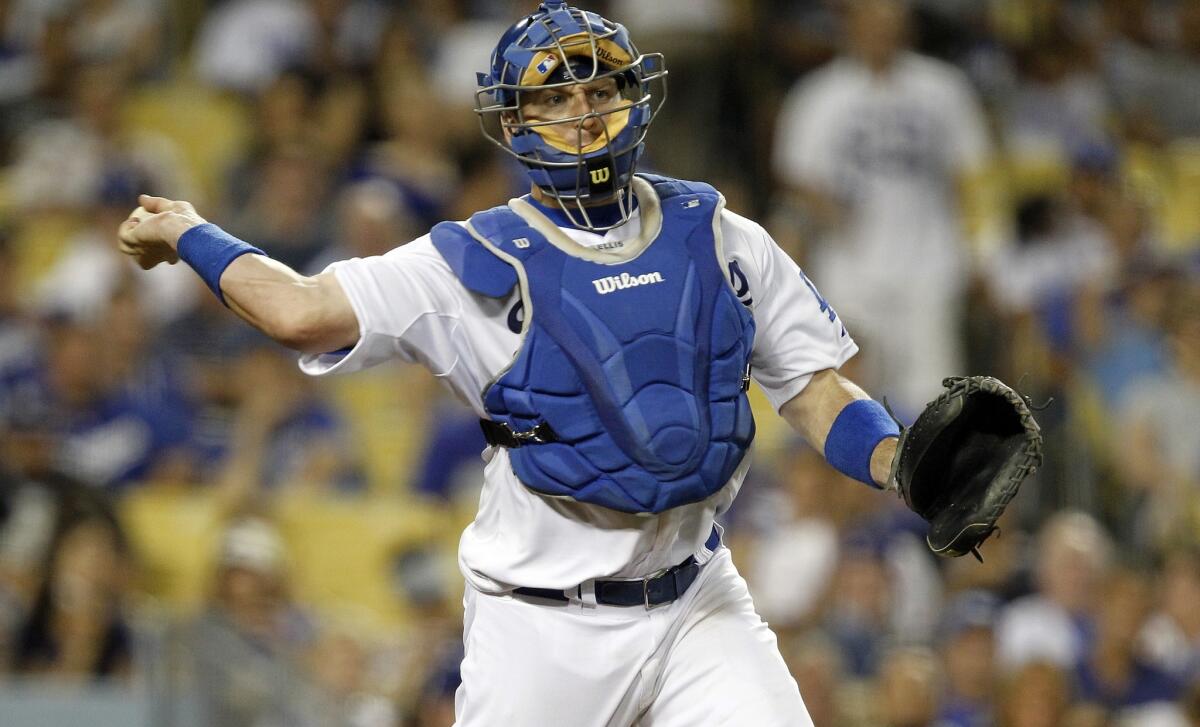 A.J. Ellis returned to the Dodgers lineup Wednesday, five weeks after an arthroscopic knee surgery.