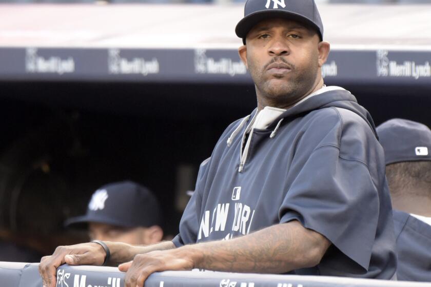 New York Yankees pitcher CC Sabathia looks on before a game Monday against the Minnesota Twins.