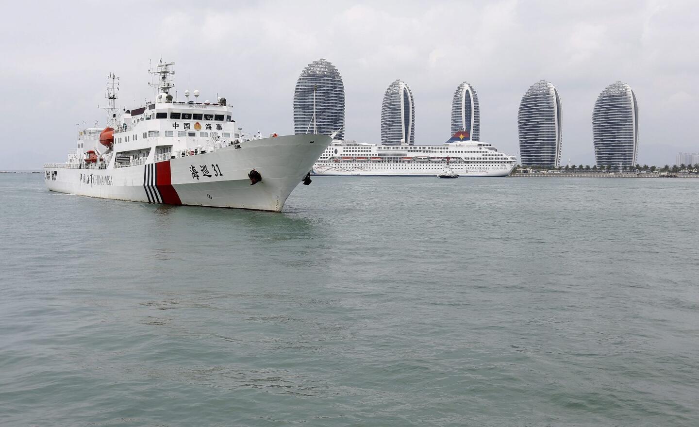 The MSA ship Haixun-31 of China's Maritime Safety Administration leaves the port after a brief stop for supplies.