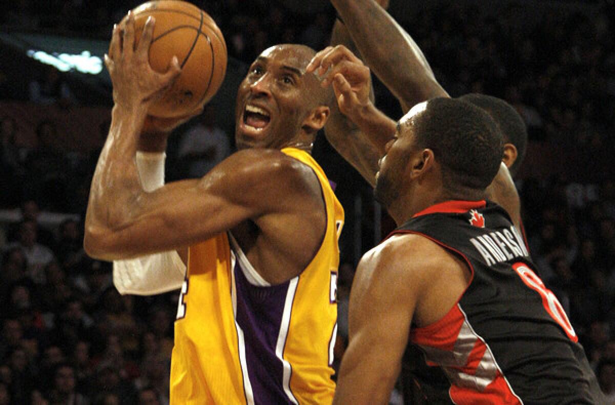 Lakers guard Kobe Bryant makes his season debut Sunday evening at Staples Center against the Toronto Raptors.